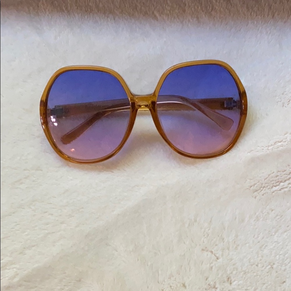 Oversized orange and blue sunglasses